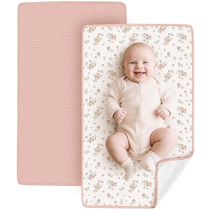2 Pack waterproof muslin cotton portable changing pad, soft and breathable for on-the-go diaper changes.