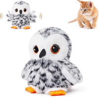 Kitten interacting with rechargeable owl cat toy