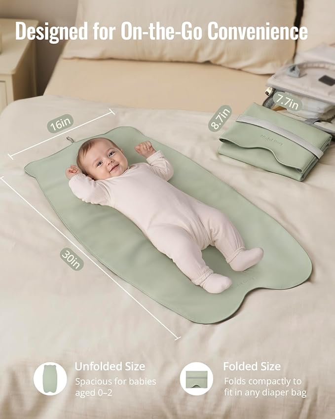 Portable baby changing mat, compact and travel-friendly for parents on the go.