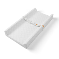 Portable foam changing pad with contoured design for safe and comfortable use.