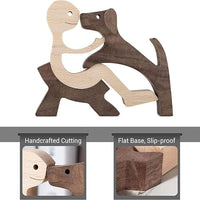 Handcrafted human and dog wooden ornament