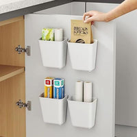 Wall mounted organizer boxes attached to cabinet doors