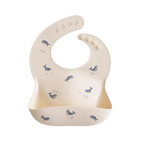 Silicone baby bib with adjustable fit, perfect for drooling and feeding.