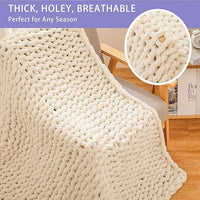 Decorative chenille throw blanket on modern couch