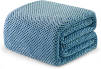 Plush lightweight blanket ideal for naps and comfort