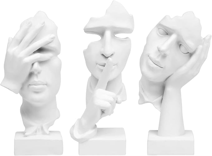Abstract white figurines featuring eye, ear and mouth covering gestures