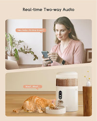 Timed cat feeding machine for dry food portion serving