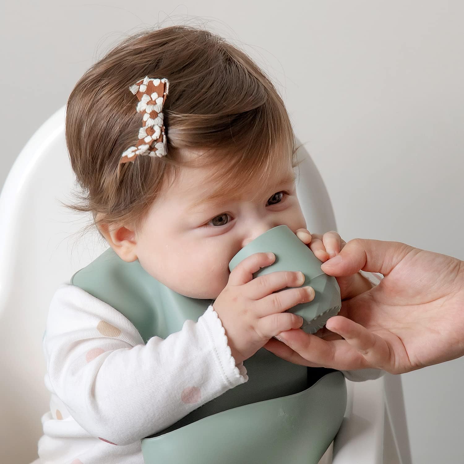 Tiny open cup for baby, supports baby led weaning and independent drinking.