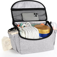 Universal stroller organizer with large capacity, multiple compartments for baby essentials.