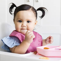 Toddler Wearing Waterproof Baby Bib at Mealtime