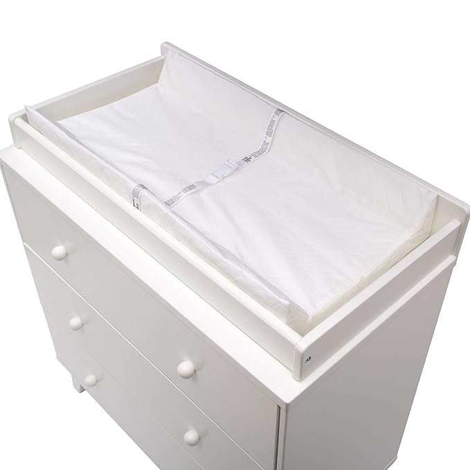 Waterproof changing pad for babies, easy to clean and perfect for diaper changes.