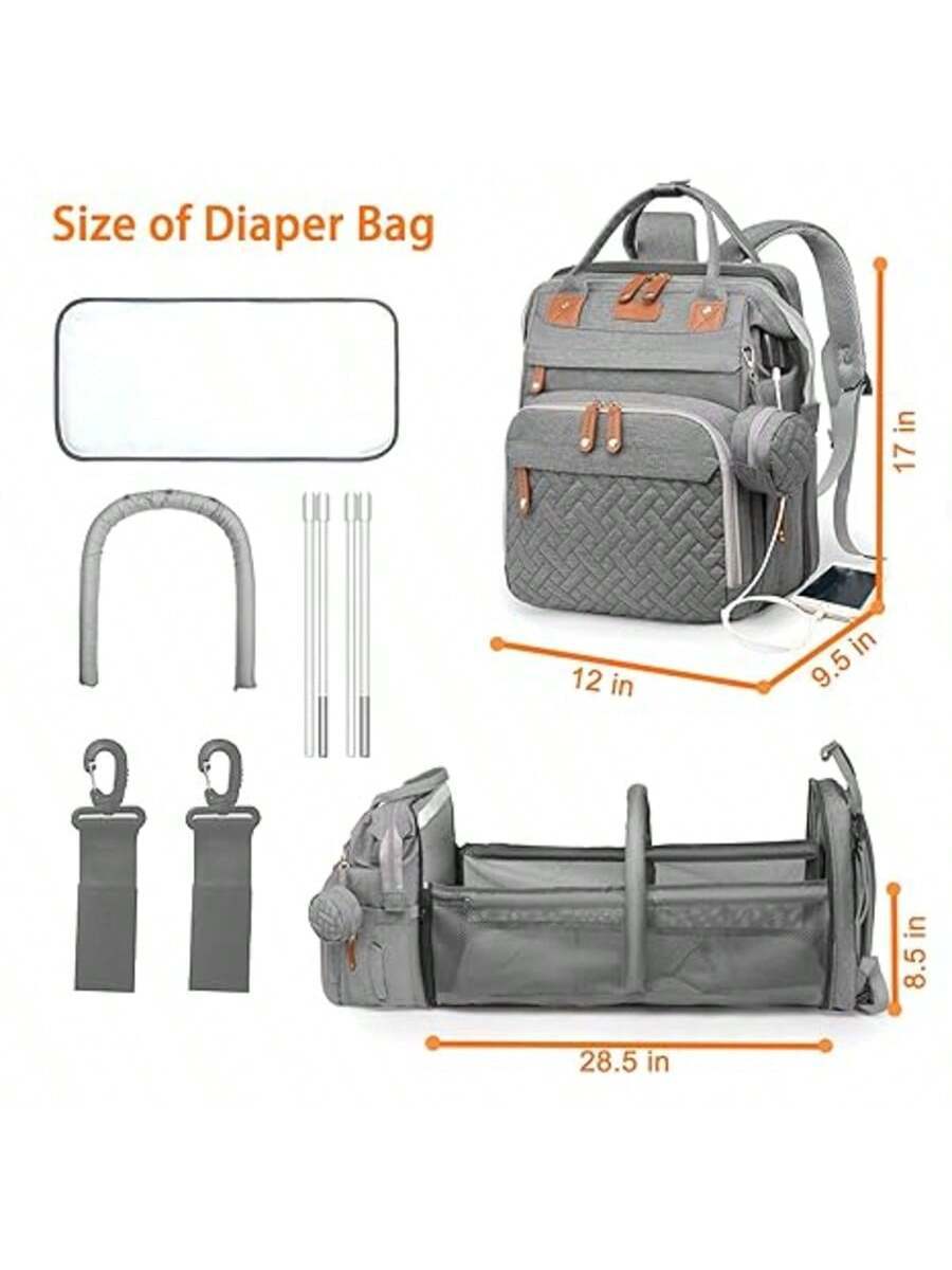 Waterproof diaper bag backpack, durable and spacious with changing pad and multiple compartments.