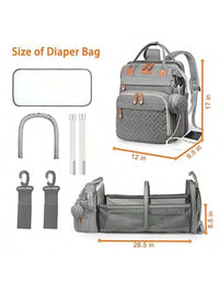 Waterproof diaper bag backpack, durable and spacious with changing pad and multiple compartments.