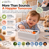 White sound machine with illuminated digital screen and orange rotary control dial