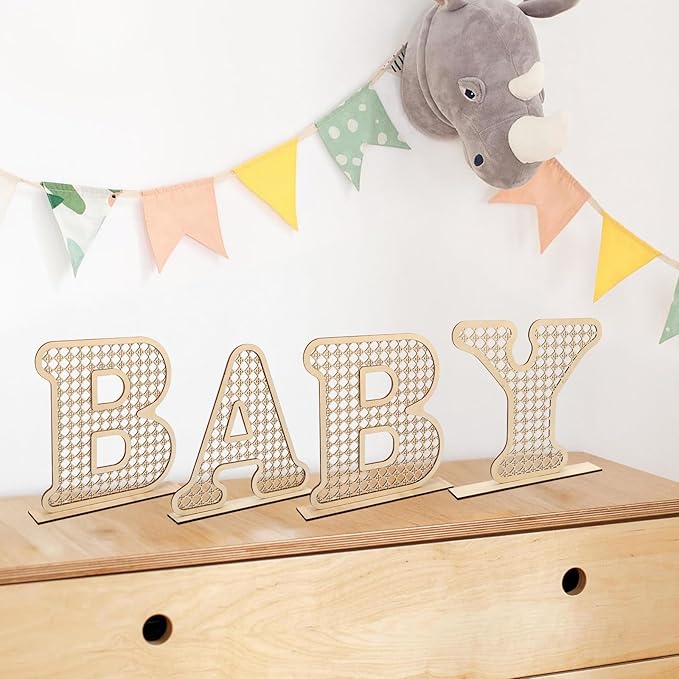 Set of four wooden baby letters, ideal for spelling names and phrases in your baby’s nursery.