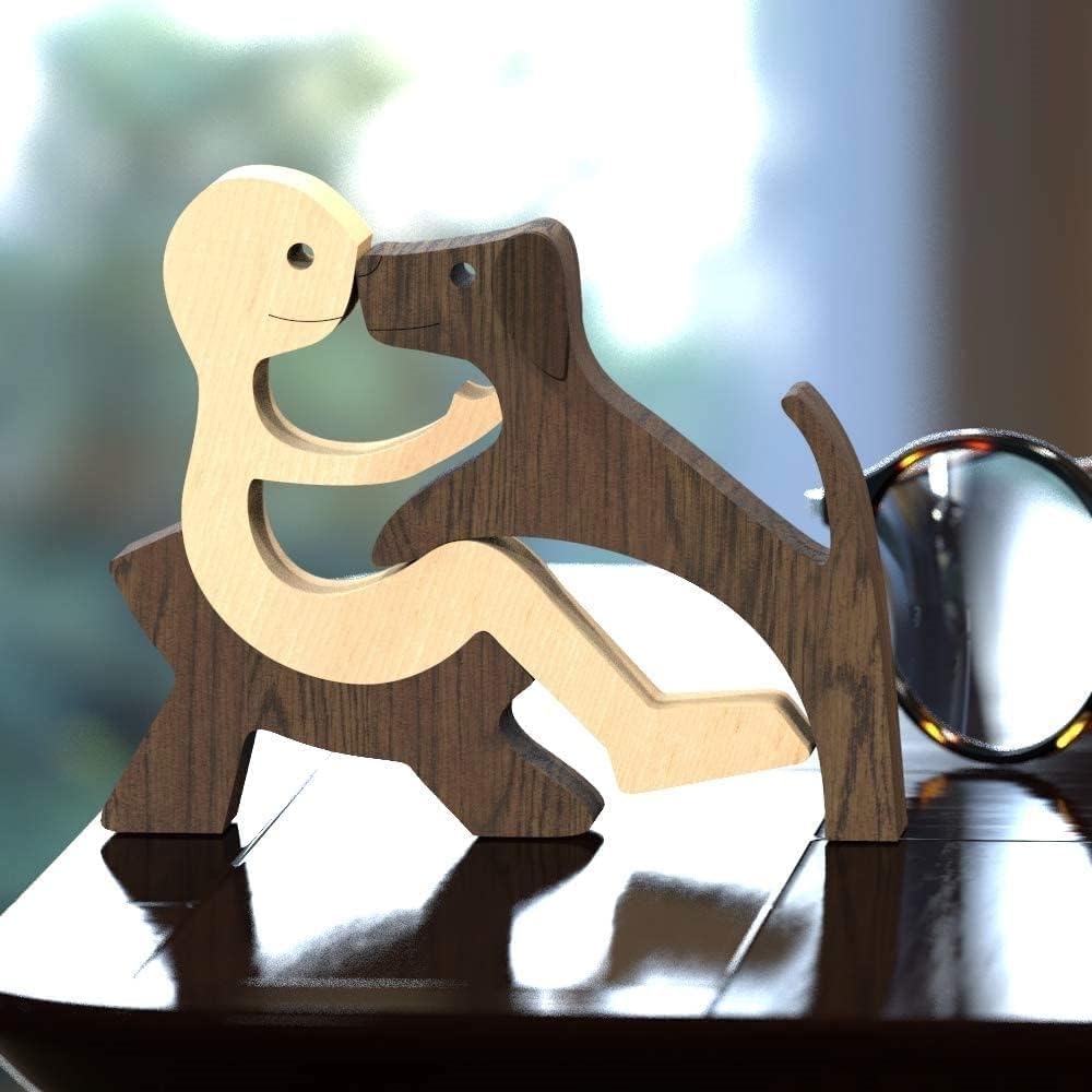Relaxing man sitting beside dog wooden figurine