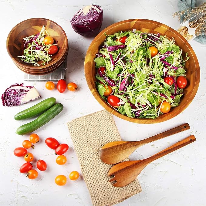 Acacia wood serving bowl filled with fresh fruit