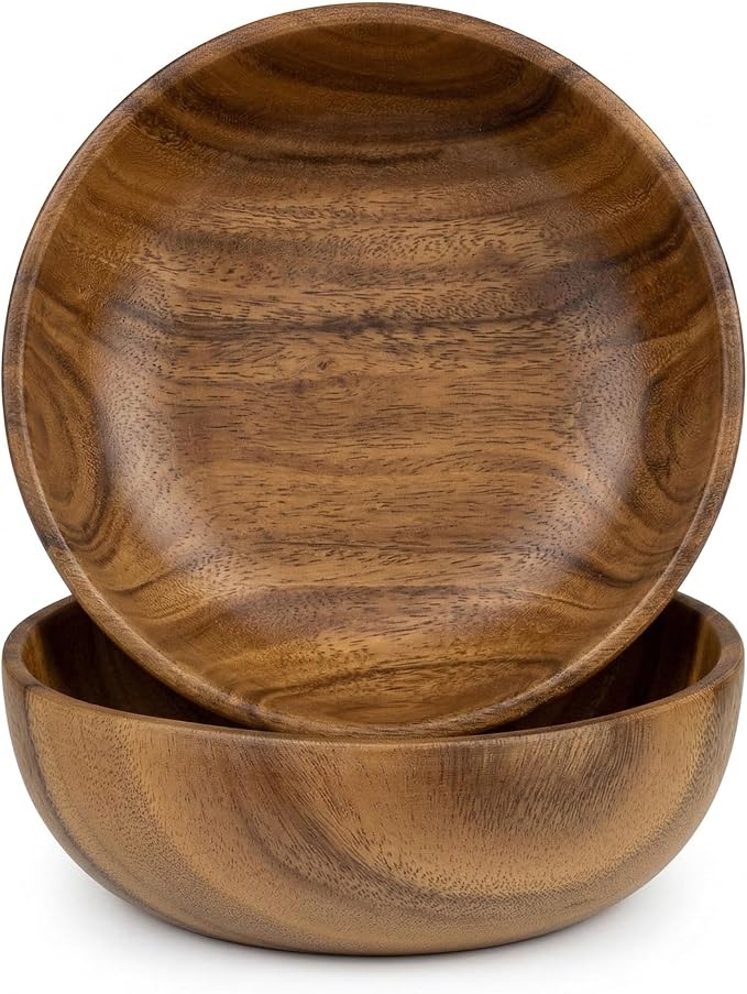 Nested acacia wood serving bowls with natural grain finish