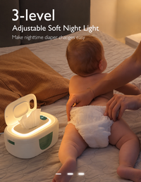 Soft three-level night light illuminating the warmer during nighttime use