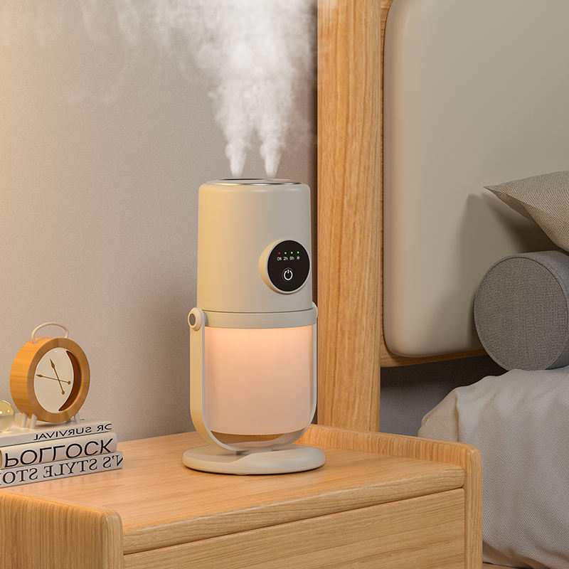Adjustable tilt spray humidifier for personal space use