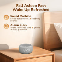 Digital alarm clock with soft night light placed on a bedside table