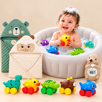 Baby bath time essentials with inflatable bathtub, hooded towels, bath toys and thermometer