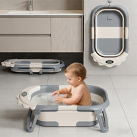 Baby bathtub with convenient drainage plug