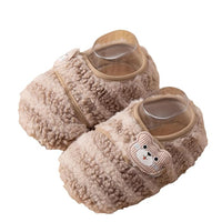  Raised ankle opening surrounded by cream fabric and smooth beige piping