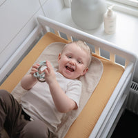 Eco-friendly organic cotton baby changing pad liner, waterproof and machine washable.