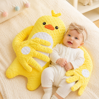 Side view of baby companion pillow with plush hand