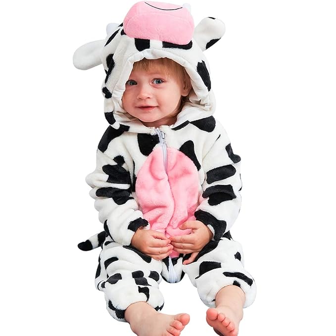 Black-and-white cow costume jumpsuit with a soft pink front panel.