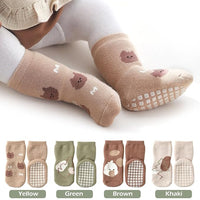 Soft floor socks for babies during supervised crawling