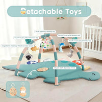Baby dinosaur play gym with overhead activity arches