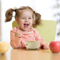 Toddler Eating from Silicone Baby Bowl, Perfect for Self-Feeding and Mess-Free Mealtime