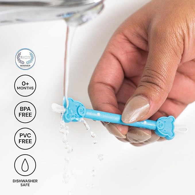 Using dual-ended tool to safely remove boogers and earwax from baby