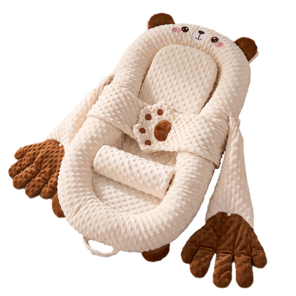 Baby patting bear lounger with soft moving hands