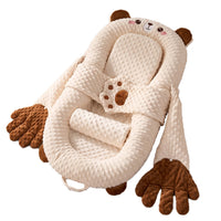 Baby patting bear lounger with soft moving hands