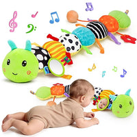 Baby play gym with padded leaf activity mat and hanging animal toys for supervised floor play