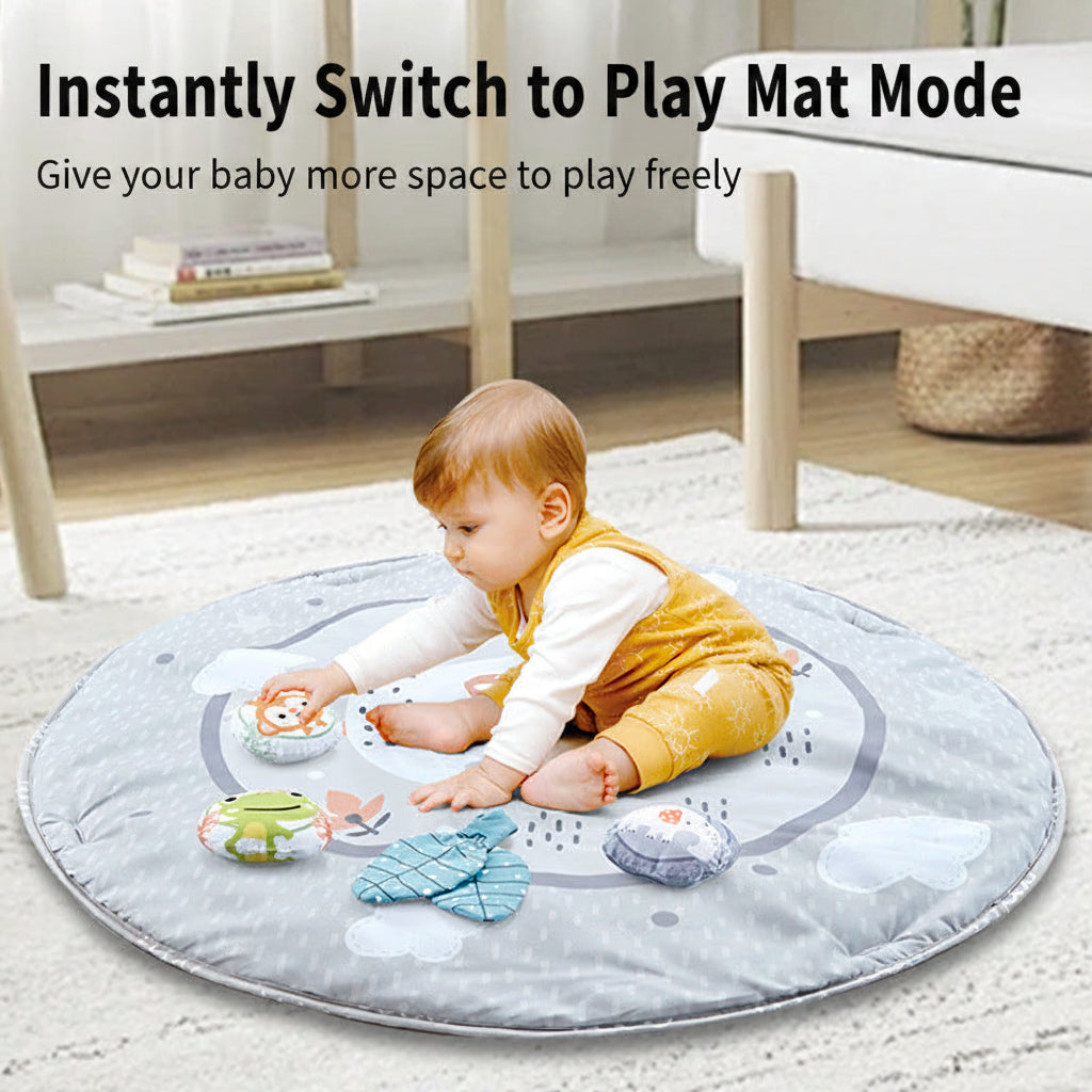 Baby play gym with soft fabric arches and animal toys