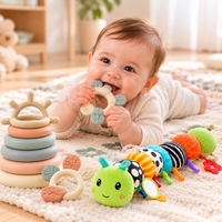 Colorful soft sensory caterpillar toy with varied patterns and textures for supervised play