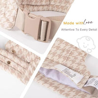 Side perspective of the wearable baby carrier showing its shape and supporting sections.