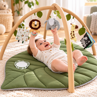 Soft stacking ring toy designed for supervised grasping and simple stacking activities
