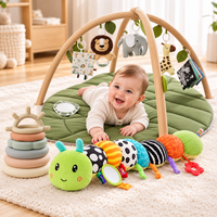 Soft stacking ring toy designed for supervised grasping and simple stacking activities
