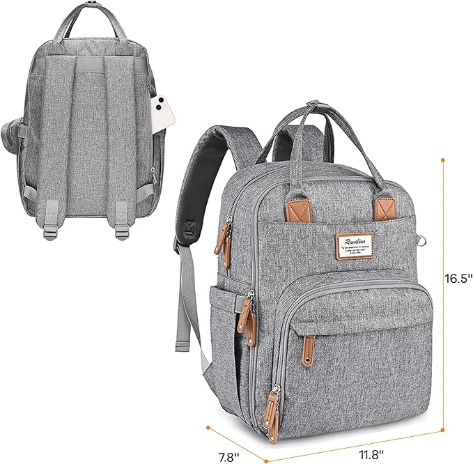 Gray diaper bag displayed with its matching foldable cushioned changing pad and pacifier pod