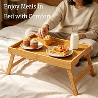 Natural bamboo tray table positioned for sofa use