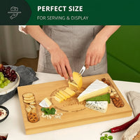 Bamboo serving board with included cheese serving utensils