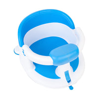 Underside view showing four attachment cups fitted beneath the bathing accessory.
