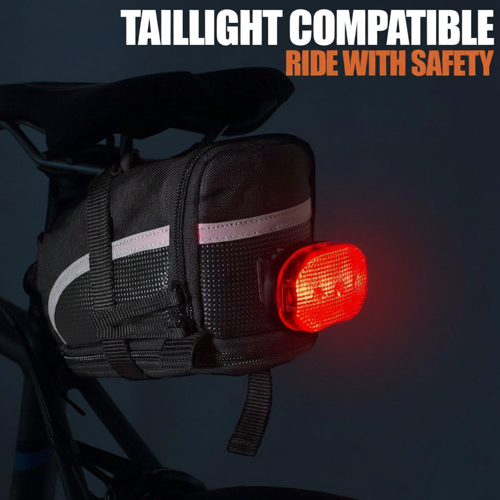 Bicycle saddle bag with rear taillight holder attachment