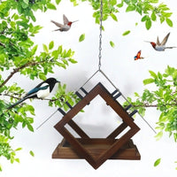 Hanging bird feeder used as outdoor garden decor