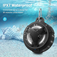 Bluetooth speaker with USB charging cable and user manual package setup